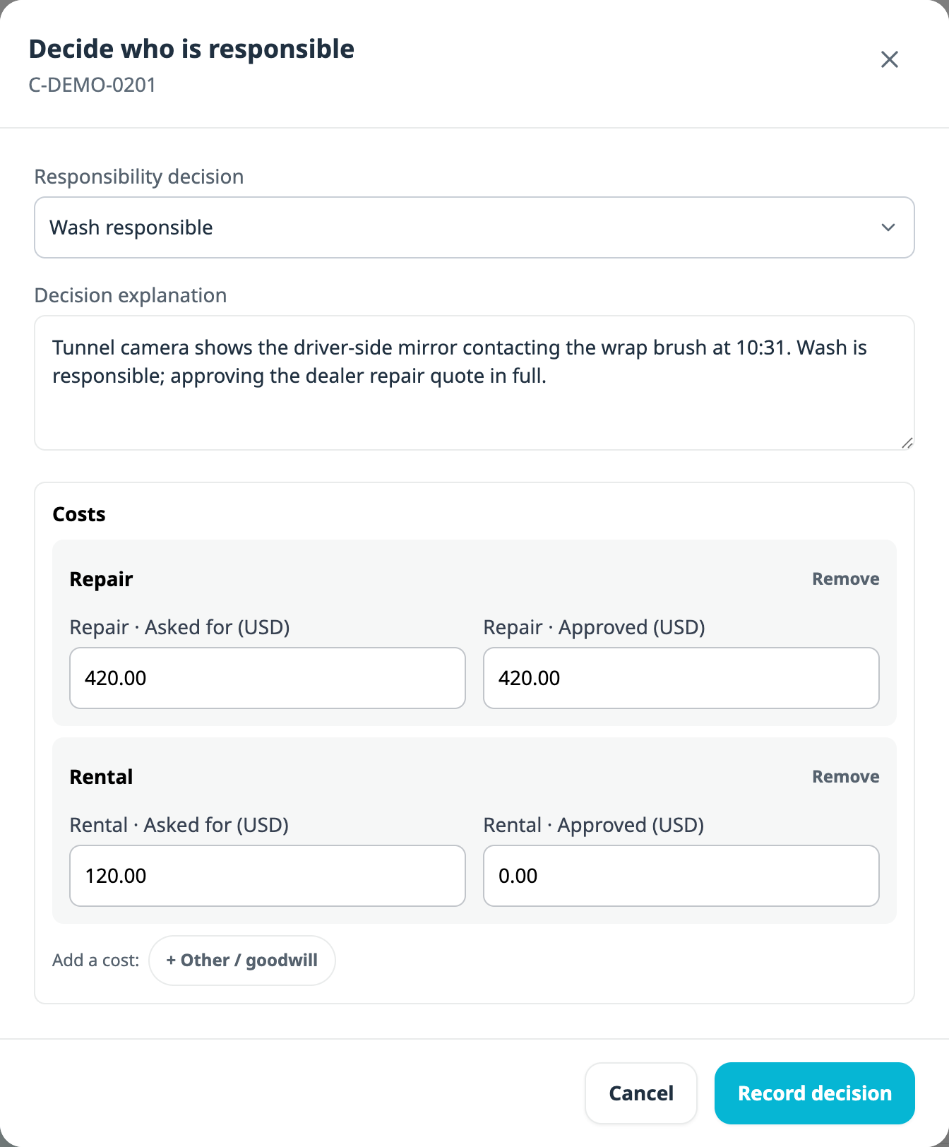 The Decide who is responsible dialog for C-DEMO-0201, with Wash responsible chosen, an explanation describing tunnel camera footage of the mirror contacting the wrap brush, and cost rows for Repair and Rental each split into Asked for and Approved in US dollars.