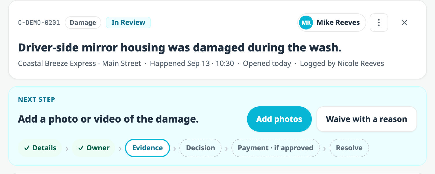 The same case now In Review and assigned to Mike Reeves, with a Next step card reading Add a photo or video of the damage, buttons for Add photos and Waive with a reason, and the path showing Details and Owner both ticked with Evidence current.