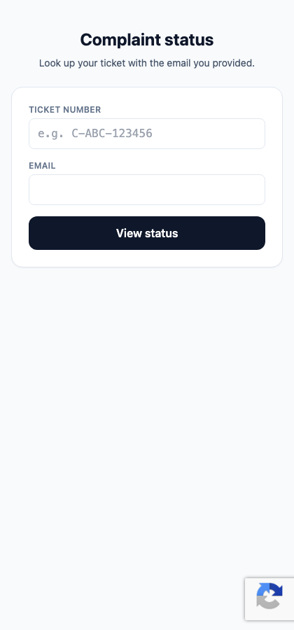 The complaint tracking page — customers look up status with their ticket number and email