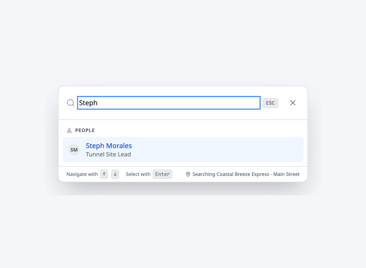 The search box at the top of WashConsole. Typing Steph finds the team member Steph Morales, and typing vacuum finds the matching work orders with their ticket numbers and status.