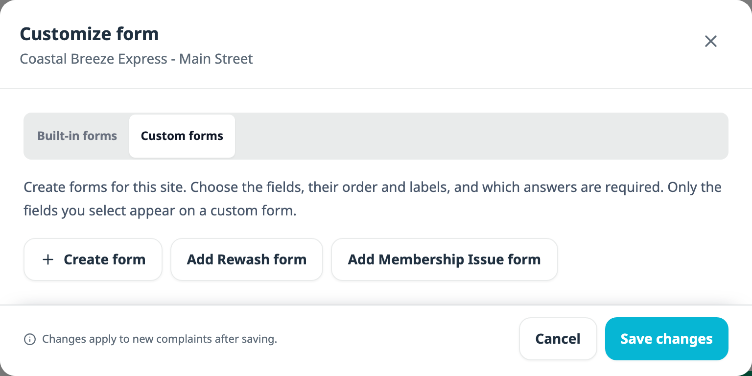 The Customize form dialog on its Custom forms tab, for Coastal Breeze Express Main Street: text explaining that only the fields you select appear on a custom form, and three buttons, Create form, Add Rewash form and Add Membership Issue form.